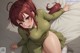 Anime girl in a green dress laying on a bed.